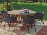 Contemporary outdoor dining set with teak table on Mediterranean terrace