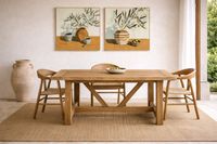 Solid wood dining table with natural sisal rug in Mediterranean Mallorca interior with warm light and handcrafted details Solid wood dining table with natural sisal rug in Mediterranean Mallorca interior with warm light and handcrafted details