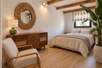 Relaxed bedroom in a Santa Catalina penthouse with natural wood, soft cotton bedding and warm Mediterranean details. Relaxed bedroom in a Santa Catalina penthouse with natural wood, soft cotton bedding and warm Mediterranean details.