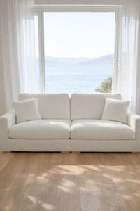 Dolce linen sofa in bright Mediterranean interior with sea view – Lifestyle Mallorca Dolce linen sofa in bright Mediterranean interior with sea view – Lifestyle Mallorca